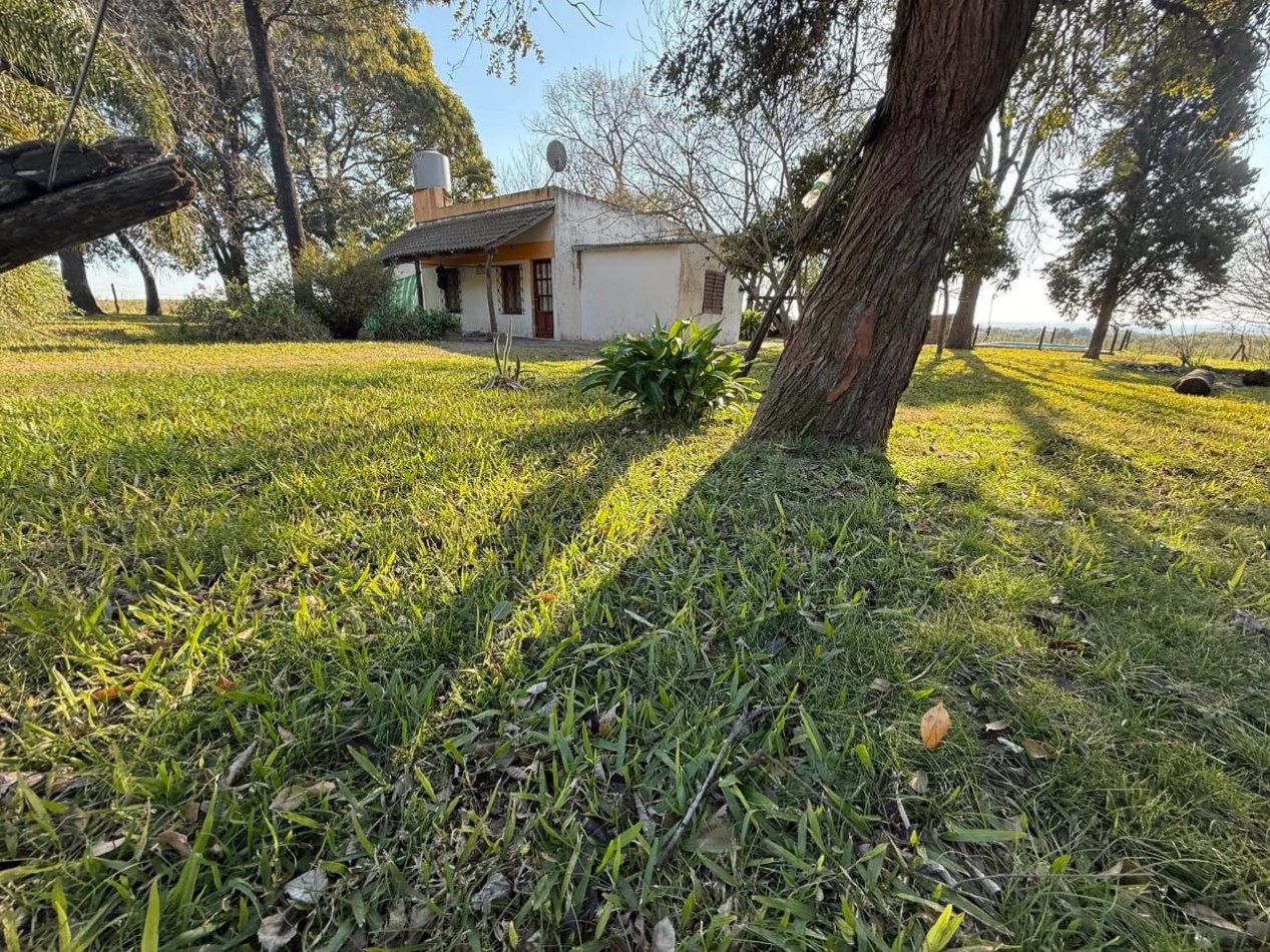 CASA DE CAMPO EN VENTA EN AMPLIO LOTE 